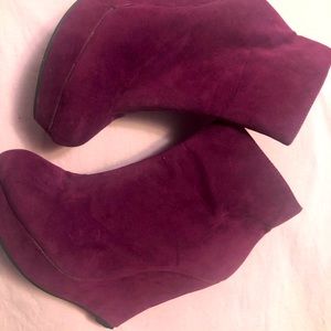 Plum suede covered wedge bootie